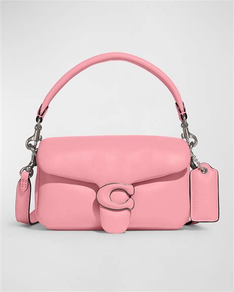 pink coach tabby bag.